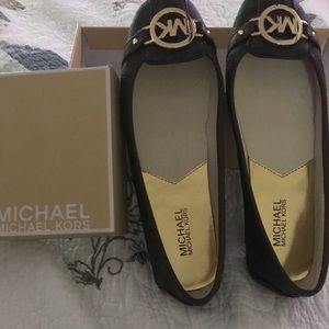 Michael Kors brown flat shoes.  Size 81/2 medium.